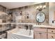 Charming bathroom with stylish tiled walls, a bathtub, a vanity with a sink and a shower at 620 State Highway 52, Erie, CO 80516