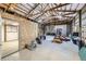 Spacious garage interior with high ceilings, ample lighting, and space for vehicles and equipment at 620 State Highway 52, Erie, CO 80516