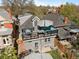 Aerial view of home with rooftop deck, patio, and fenced backyard at 3354 Vallejo St, Denver, CO 80211