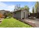 Private backyard with a well maintained lawn, patio area and garden at 3354 Vallejo St, Denver, CO 80211