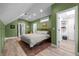 Spacious bedroom featuring hardwood floors, an oriental rug, and a walk-in closet at 3354 Vallejo St, Denver, CO 80211