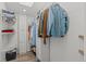 Organized closet with clothing racks, shelves, skylight, and new flooring at 3354 Vallejo St, Denver, CO 80211