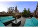 Relax on this beautiful deck with outdoor seating, umbrella, and great views at 3354 Vallejo St, Denver, CO 80211