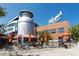 Unique exterior of Little Personal Ice Cream, featuring a giant milk can structure and outdoor seating at 3354 Vallejo St, Denver, CO 80211