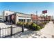 Street-level view of Highland Tap Burger with outdoor patio and vibrant landscaping at 3354 Vallejo St, Denver, CO 80211