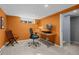 Bright basement home office with modern desk and chair at 3354 Vallejo St, Denver, CO 80211