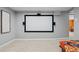 Home movie room with large screen and surround sound at 3354 Vallejo St, Denver, CO 80211