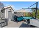 Spacious rooftop deck featuring comfortable seating and a large umbrella at 3354 Vallejo St, Denver, CO 80211