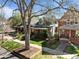 Charming Denver street featuring well-maintained homes and a mature tree lining the sidewalk at 3354 Vallejo St, Denver, CO 80211