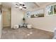 Comfortable bedroom featuring neutral walls, two windows, and ample space at 7695 S Harlan St, Littleton, CO 80128