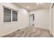 Bedroom features neutral carpet, neutral paint and a window at 1960 E 166Th Dr, Thornton, CO 80602