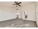 Spacious bedroom with neutral carpet and open entryway at 1960 E 166Th Dr, Thornton, CO 80602