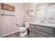 This bathroom has updated vanity with modern fixtures and neutral decor at 2237 Barela Dr, Berthoud, CO 80513