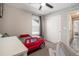 Cozy bedroom featuring a built-in desk and a race car bed at 2237 Barela Dr, Berthoud, CO 80513