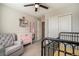 bedroom with a pink dresser and a gray armchair at 2237 Barela Dr, Berthoud, CO 80513