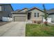 Modern Ranch style home with 2-car garage and landscaped yard at 2237 Barela Dr, Berthoud, CO 80513