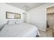 Bedroom featuring a comfortable queen bed, and closet at 19197 E 64Th Ave, Denver, CO 80249