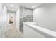 Second floor hallway with decorative wallpaper and views of the interior design at 19197 E 64Th Ave, Denver, CO 80249