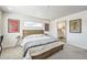 Stylish main bedroom adjacent to the main bathroom at 19197 E 64Th Ave, Denver, CO 80249