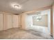 Unfinished basement providing ample space for storage or future renovation and customization at 15769 E Greenwood Dr, Aurora, CO 80013
