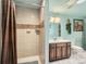 Bathroom featuring a shower with tiling, a vanity with a mirror and a toilet at 15769 E Greenwood Dr, Aurora, CO 80013