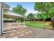 Enjoy outdoor living in this spacious backyard with a covered patio and gravel area at 4672 S Lewiston Way, Aurora, CO 80015