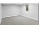 This bedroom offers neutral finishes, a bright window and soft carpeting at 4672 S Lewiston Way, Aurora, CO 80015