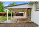 Covered patio offers a cool outdoor retreat perfect for relaxing or entertaining at 4672 S Lewiston Way, Aurora, CO 80015