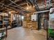 Unfinished basement showcasing utilities, storage solutions, and potential for customization at 1024 S Columbine St, Denver, CO 80209