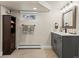 Bathroom with modern vanity, stylish fixtures, and neutral finishes at 1024 S Columbine St, Denver, CO 80209