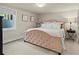 Cozy bedroom featuring a comfortable bed, soft lighting, and minimalist decor creating a relaxing retreat at 1024 S Columbine St, Denver, CO 80209