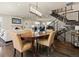 Cozy dining room area with staircase and open-concept living space at 1024 S Columbine St, Denver, CO 80209