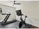 A well-equipped exercise room showcasing both a treadmill and a stationary bike for convenient at-home fitness at 1024 S Columbine St, Denver, CO 80209