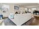 Spacious living room featuring a fireplace and comfortable seating arrangements at 1024 S Columbine St, Denver, CO 80209