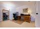 Cozy office setup with a wooden desk, comfortable chair, and ample storage at 4945 Twin Lakes Rd # 44, Boulder, CO 80301