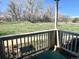 Inviting outdoor porch showcasing a railing, blue mat, and views of the surrounding landscape at 4945 Twin Lakes Rd # 44, Boulder, CO 80301