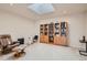 Spacious room featuring a skylight and custom built in shelving and a skylight at 3546 Broadlands Ln # 102, Broomfield, CO 80023
