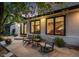 Cozy front porch with rocking chairs and a small table, ideal for relaxing outdoors. View of staircase at 1609 S Clayton St, Denver, CO 80210