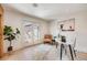 Bright office space with double doors, light wood floors, and a stylish desk at 1609 S Clayton St, Denver, CO 80210