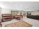 Large basement area with pianos, organ, and entertainment area with a lake view at 997 Dogwood Dr, Golden, CO 80401
