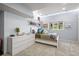 Bright bedroom with natural light, a comfortable bed, and decorative shelving at 997 Dogwood Dr, Golden, CO 80401