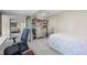 Versatile office space with bed, closet, and built-in shelving at 997 Dogwood Dr, Golden, CO 80401