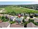 Aerial view of home in neighborhood with green spaces at 7329 Arco Iris Ln, Castle Pines, CO 80108