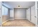 Versatile basement space with natural light, finished floors and closet space, ideal for a home office or play area at 7329 Arco Iris Ln, Castle Pines, CO 80108