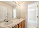 Bathroom with double sinks and a separate shower at 11729 Elmer Linn Dr, Longmont, CO 80504