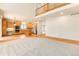 Kitchen with light wood cabinets, stainless steel appliances, and an island at 11729 Elmer Linn Dr, Longmont, CO 80504