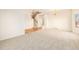 Spacious living area with hardwood floors and open staircase at 11729 Elmer Linn Dr, Longmont, CO 80504