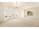Large living room with bay window and ample natural light at 11729 Elmer Linn Dr, Longmont, CO 80504