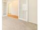 Open floor plan with French doors and hardwood floors at 11729 Elmer Linn Dr, Longmont, CO 80504