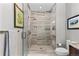 Bathroom showcasing a tiled walk-in shower with modern fixtures at 4200 W 17Th Ave # 912, Denver, CO 80204